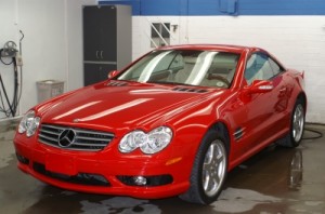 Red Mercedes Benz at Nylunds Collision Center